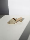 beige fabric covered slide heel sandal 