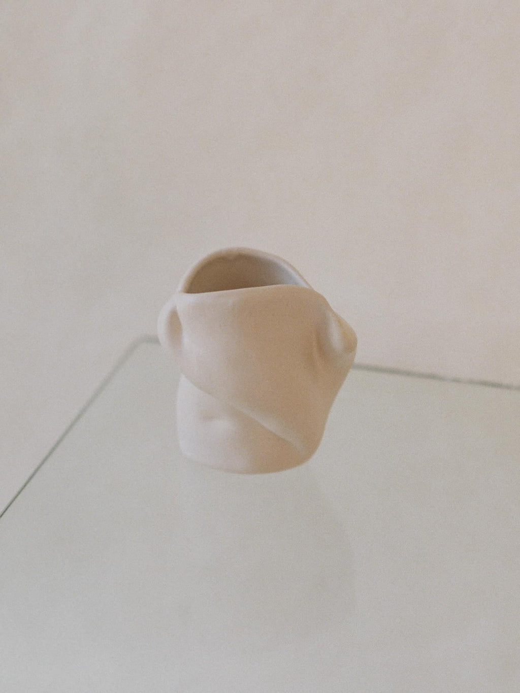 sculpted white creamic vase